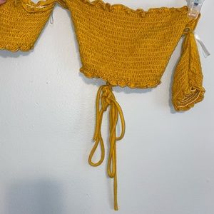 Mustard yellow crop top with short sleeves